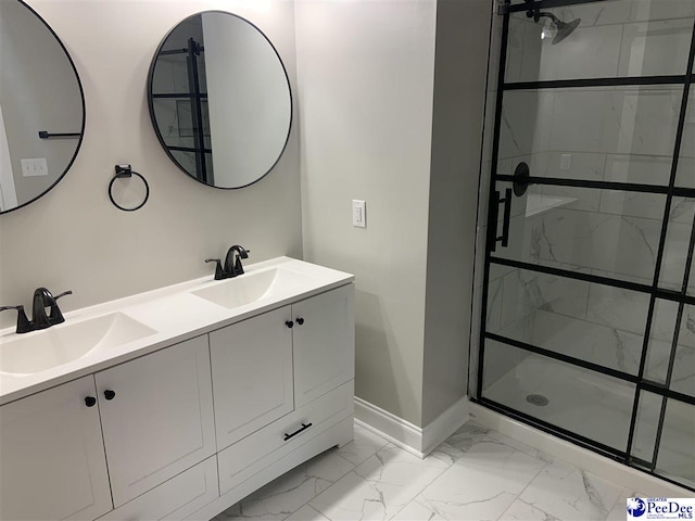 bathroom featuring vanity and tiled shower