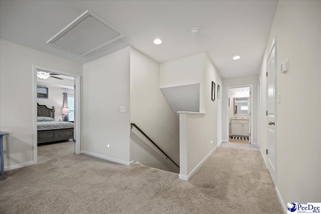 1757 Lake Wateree Dr, Florence, SC 29501 - corridor featuring attic access, an upstairs landing, carpet floors, plenty of natural light, and recessed lighting