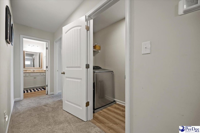 1757 Lake Wateree Dr, Florence, SC 29501 - laundry room featuring washer / clothes dryer and light carpet