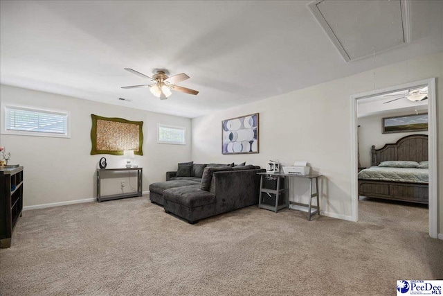 1757 Lake Wateree Dr, Florence, SC 29501 - living room with attic access, ceiling fan, and light colored carpet