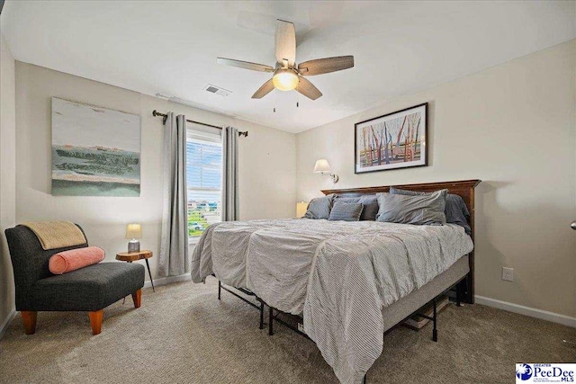 1757 Lake Wateree Dr, Florence, SC 29501 - carpeted bedroom featuring baseboards and ceiling fan