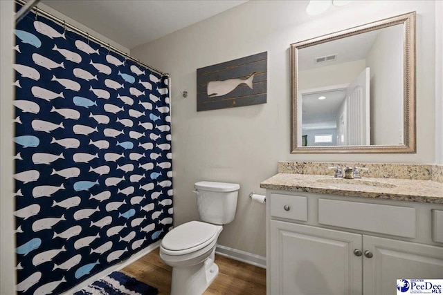 1757 Lake Wateree Dr, Florence, SC 29501 - bathroom with vanity, wood finished floors, and curtained shower