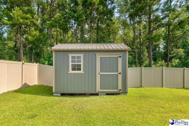 1757 Lake Wateree Dr, Florence, SC 29501 - view of shed with a fenced backyard