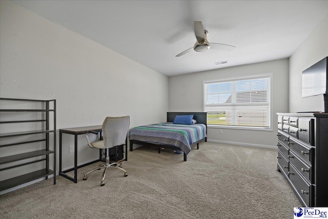 1757 Lake Wateree Dr, Florence, SC 29501 - carpeted bedroom featuring baseboards and ceiling fan