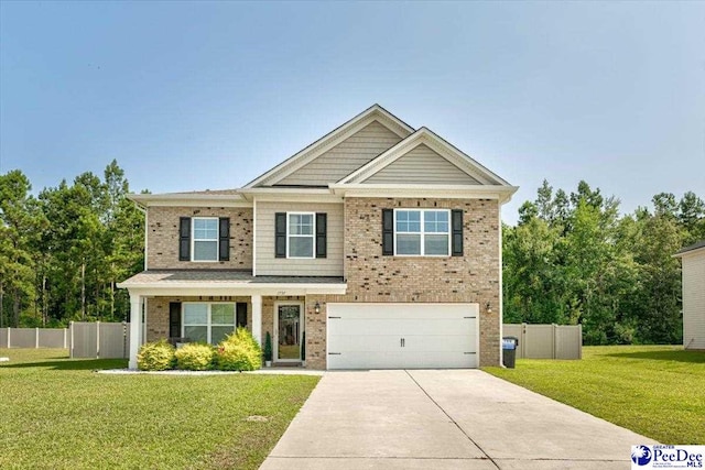 1757 Lake Wateree Dr, Florence, SC 29501 - craftsman house with concrete driveway, an attached garage, and brick siding