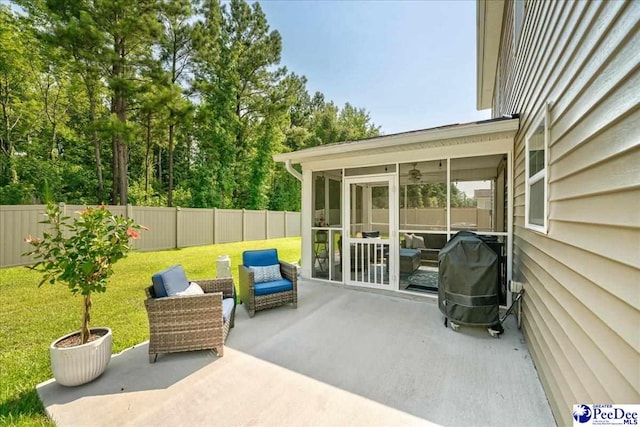 1757 Lake Wateree Dr, Florence, SC 29501 - fenced backyard with a sunroom, a patio area, and area for grilling