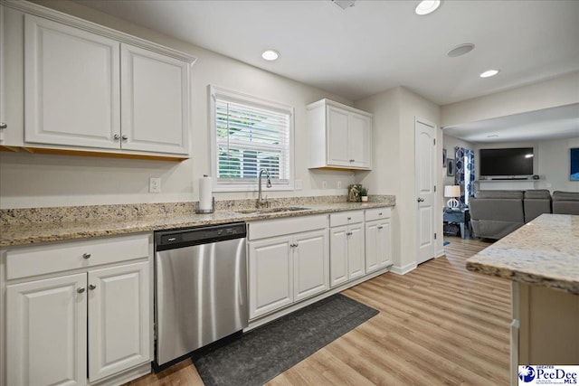 1757 Lake Wateree Dr, Florence, SC 29501 - kitchen featuring dishwasher, white cabinets, light wood-style flooring, recessed lighting, and open floor plan
