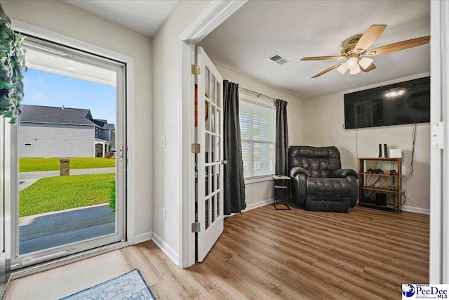 1757 Lake Wateree Dr, Florence, SC 29501 - sitting room featuring wood finished floors and a ceiling fan