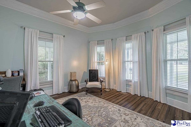 bedroom with crown molding, ceiling fan, wood finished floors, and baseboards