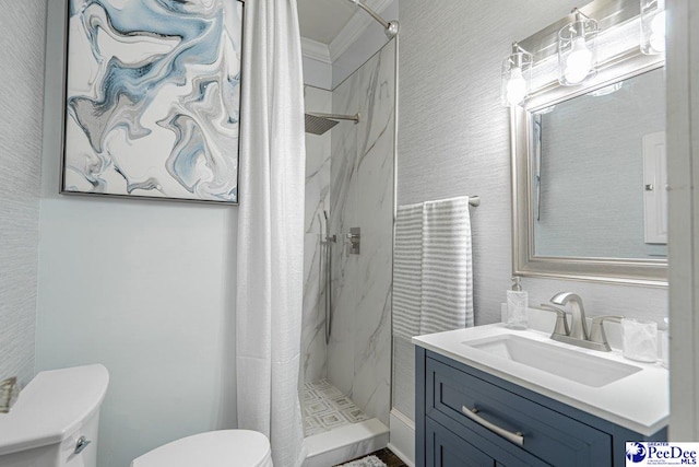 full bathroom with toilet, a marble finish shower, and vanity