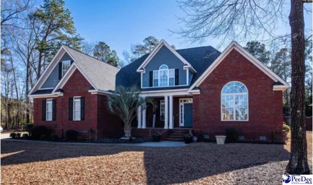 3438 Hammock Ct, Florence, SC 29501 - view of front of home with covered porch and brick siding