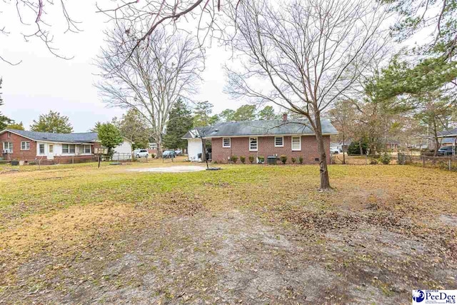 view of front of home with a front yard