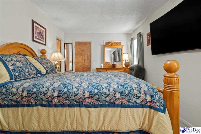 bedroom with a textured ceiling