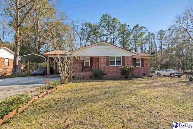 single story home featuring brick siding, concrete driveway, crawl space, a carport, and a front yard