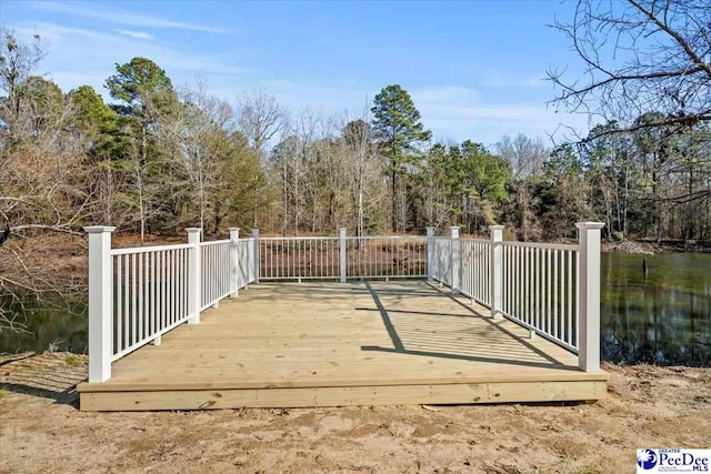 deck featuring a water view