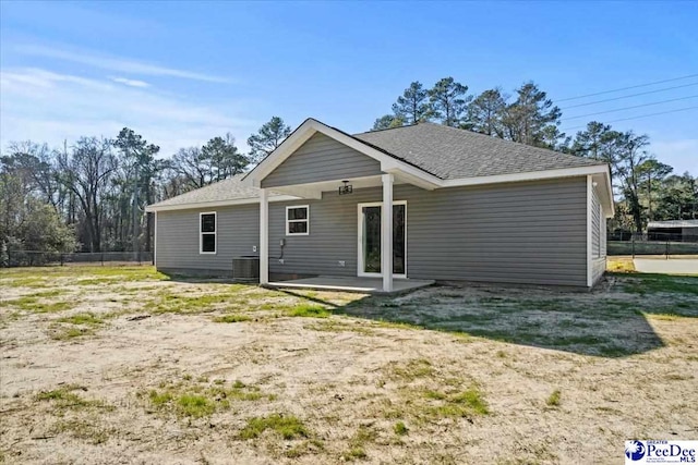 back of house with a patio area and central air condition unit