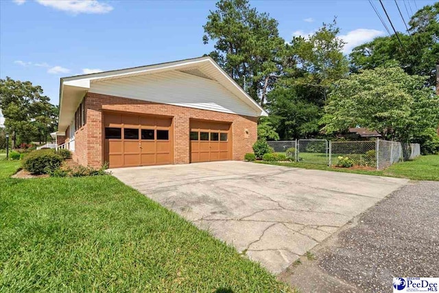 1812 Woods Dr, Florence, SC 29505 - garage with concrete driveway