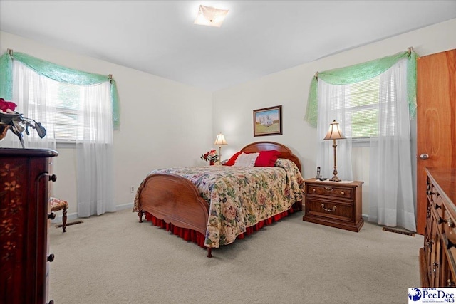 1812 Woods Dr, Florence, SC 29505 - carpeted bedroom featuring baseboards