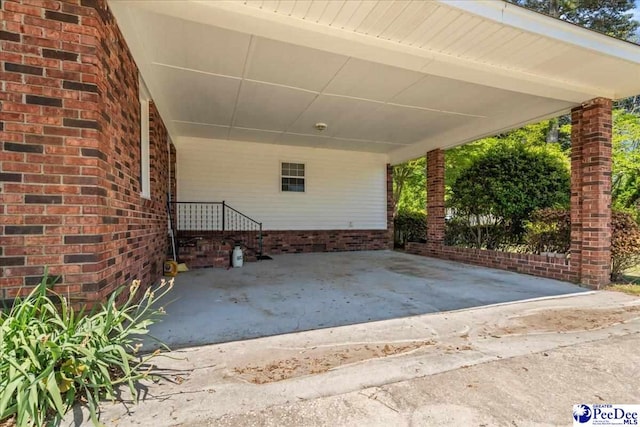 view of patio / terrace with a carport