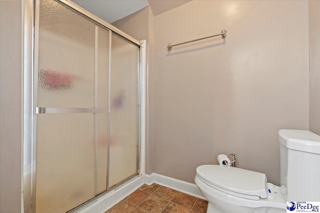 full bathroom with tile patterned flooring, baseboards, a shower stall, and toilet