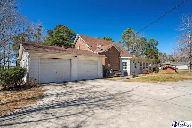 view of front of house featuring driveway and an attached garage