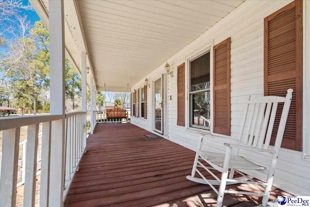 deck featuring covered porch