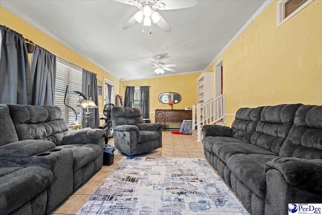 living area featuring stairs, ceiling fan, light tile patterned flooring, and crown molding