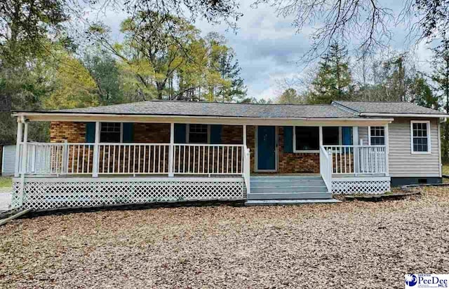 back of house featuring a porch and crawl space
