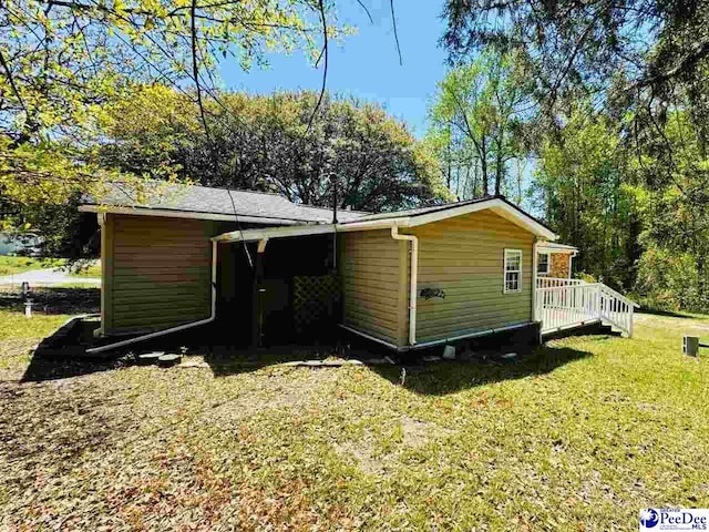 exterior space with a yard