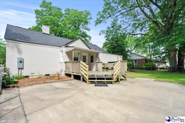 312 Greene St, Cheraw, SC 29520 - back of house featuring a wooden deck, a chimney, and roof with shingles