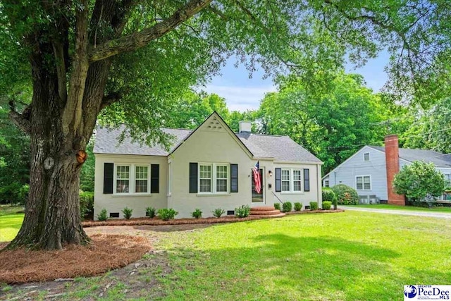 312 Greene St, Cheraw, SC 29520 - view of front of home with a front lawn and stucco siding