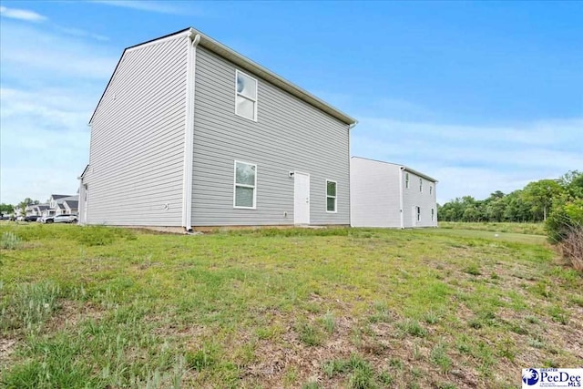 3229 Winding Way Dr, Florence, SC 29506 - back of property featuring a yard