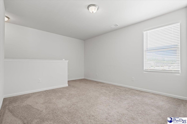 3229 Winding Way Dr, Florence, SC 29506 - carpeted empty room featuring baseboards