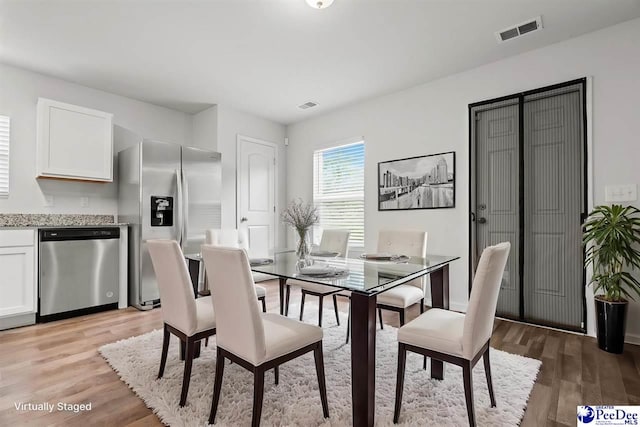 3229 Winding Way Dr, Florence, SC 29506 - dining room featuring light wood-type flooring