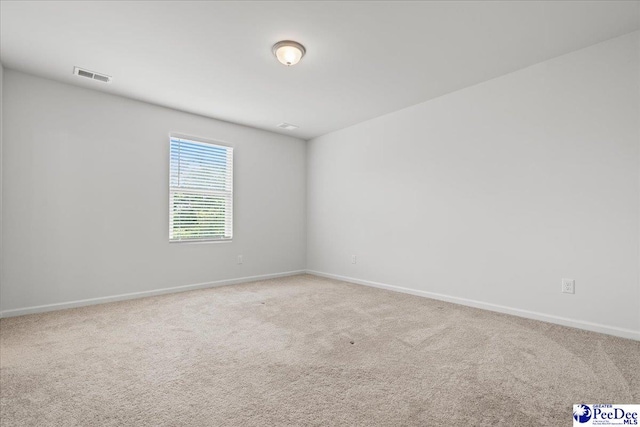 3229 Winding Way Dr, Florence, SC 29506 - carpeted spare room featuring baseboards