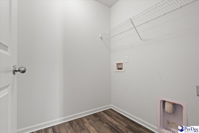 3229 Winding Way Dr, Florence, SC 29506 - laundry area with hookup for a washing machine, dark wood-type flooring, and baseboards