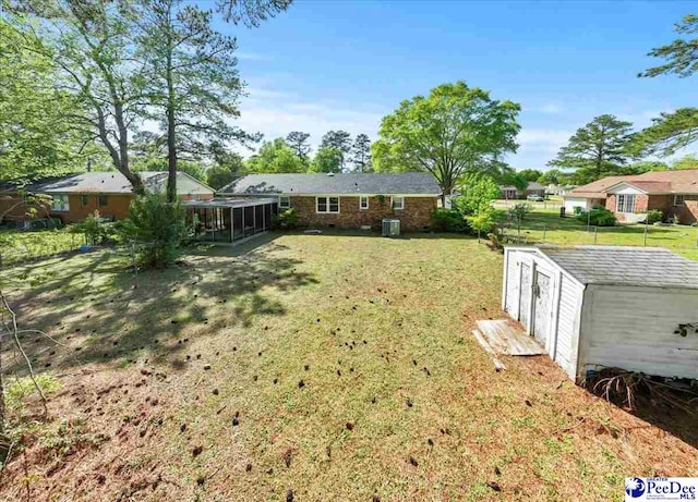 view of yard featuring a sunroom