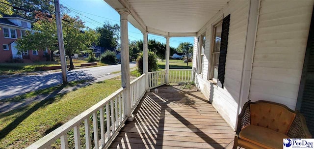 wooden deck with a porch