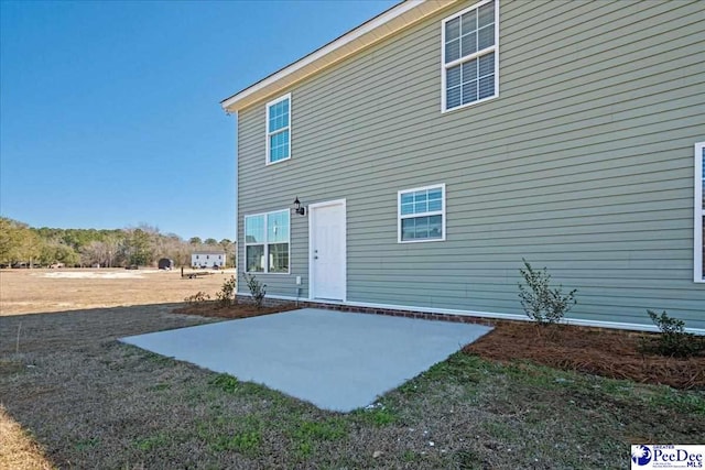 rear view of house with a patio area