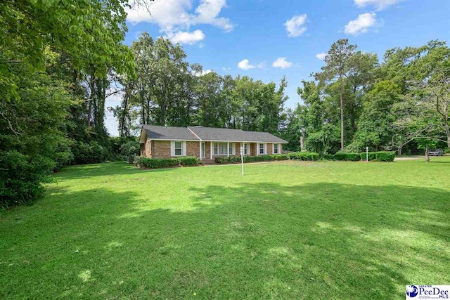 3116 Kenfield Ln, Florence, SC 29505 - ranch-style house with a front lawn