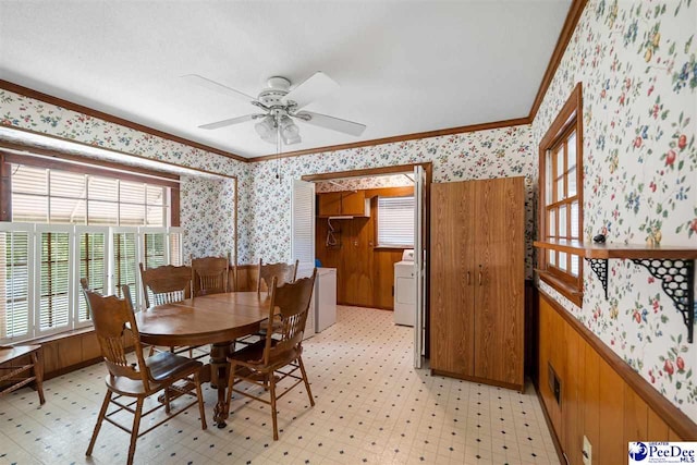 3116 Kenfield Ln, Florence, SC 29505 - dining space with wallpapered walls, ornamental molding, light flooring, washer / dryer, and a ceiling fan