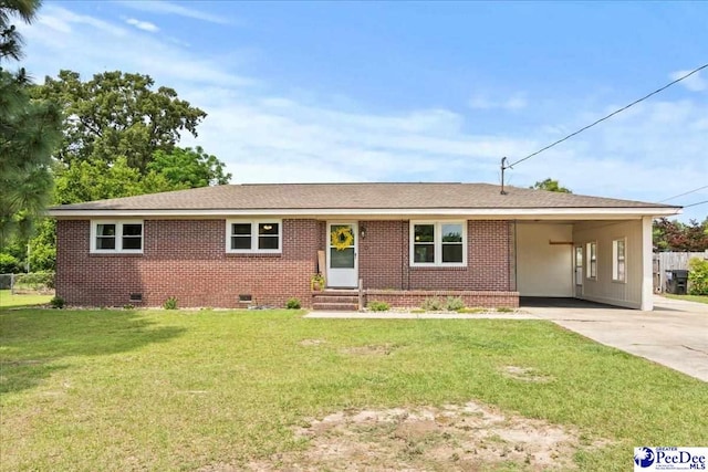 2217 W Mccown Dr, Florence, SC 29501 - single story home featuring a carport, concrete driveway, crawl space, a front yard, and entry steps