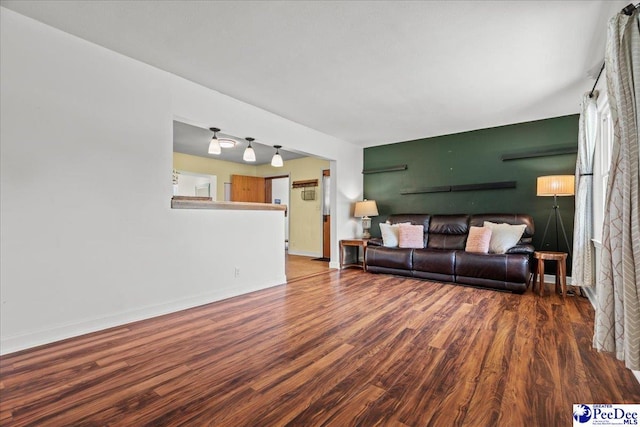 2217 W Mccown Dr, Florence, SC 29501 - living room featuring wood finished floors and baseboards