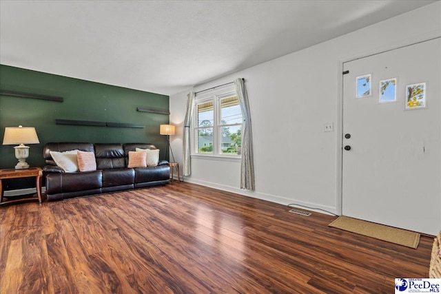 2217 W Mccown Dr, Florence, SC 29501 - living area with wood finished floors and baseboards