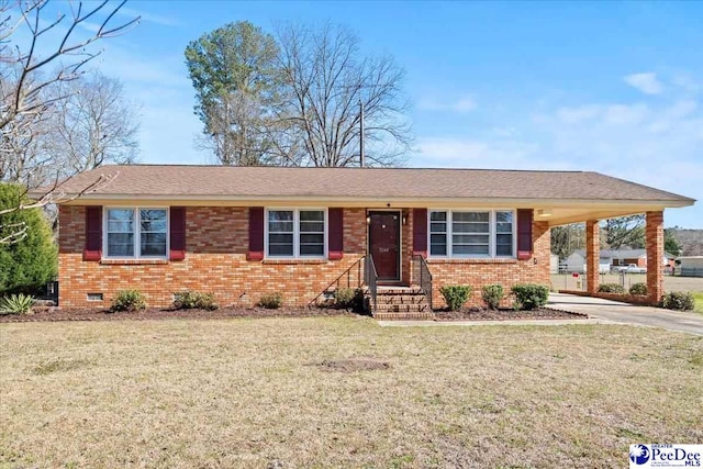 ranch-style house with brick siding, a carport, concrete driveway, a front yard, and crawl space