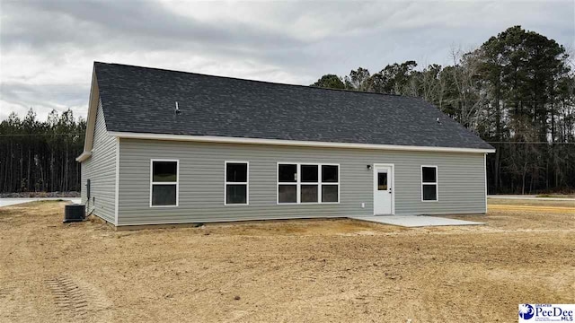 back of property with a patio area