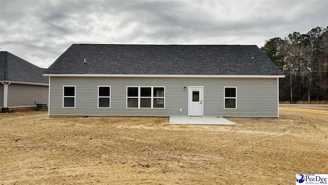 back of property featuring central AC and a patio