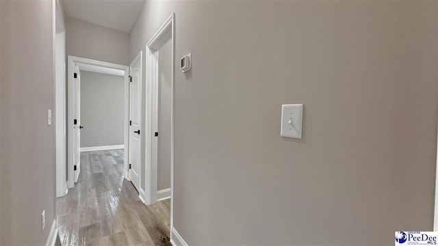 hall featuring light hardwood / wood-style floors