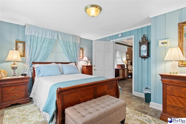 bedroom with ornamental molding