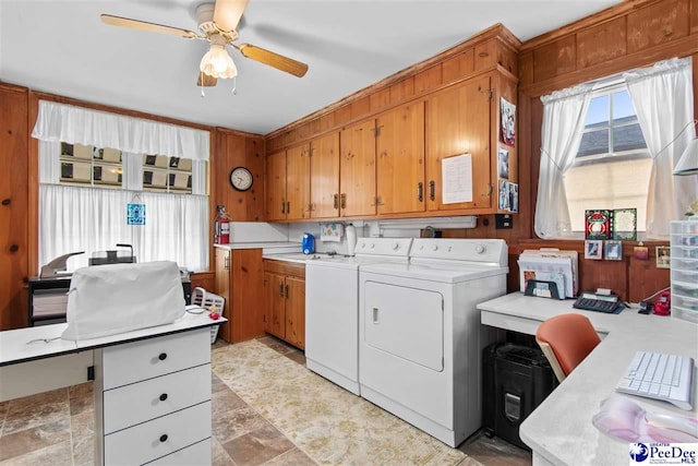 clothes washing area featuring cabinets, ceiling fan, wine cooler, and washer and clothes dryer